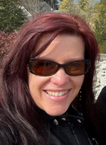Photo of Ria Schalnat wearing Sunglasses