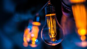 selective focus photography of clear lightbulb